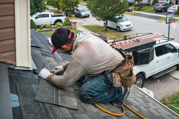 Professional Flat Roof Repair technician working in Montpelier, IA
